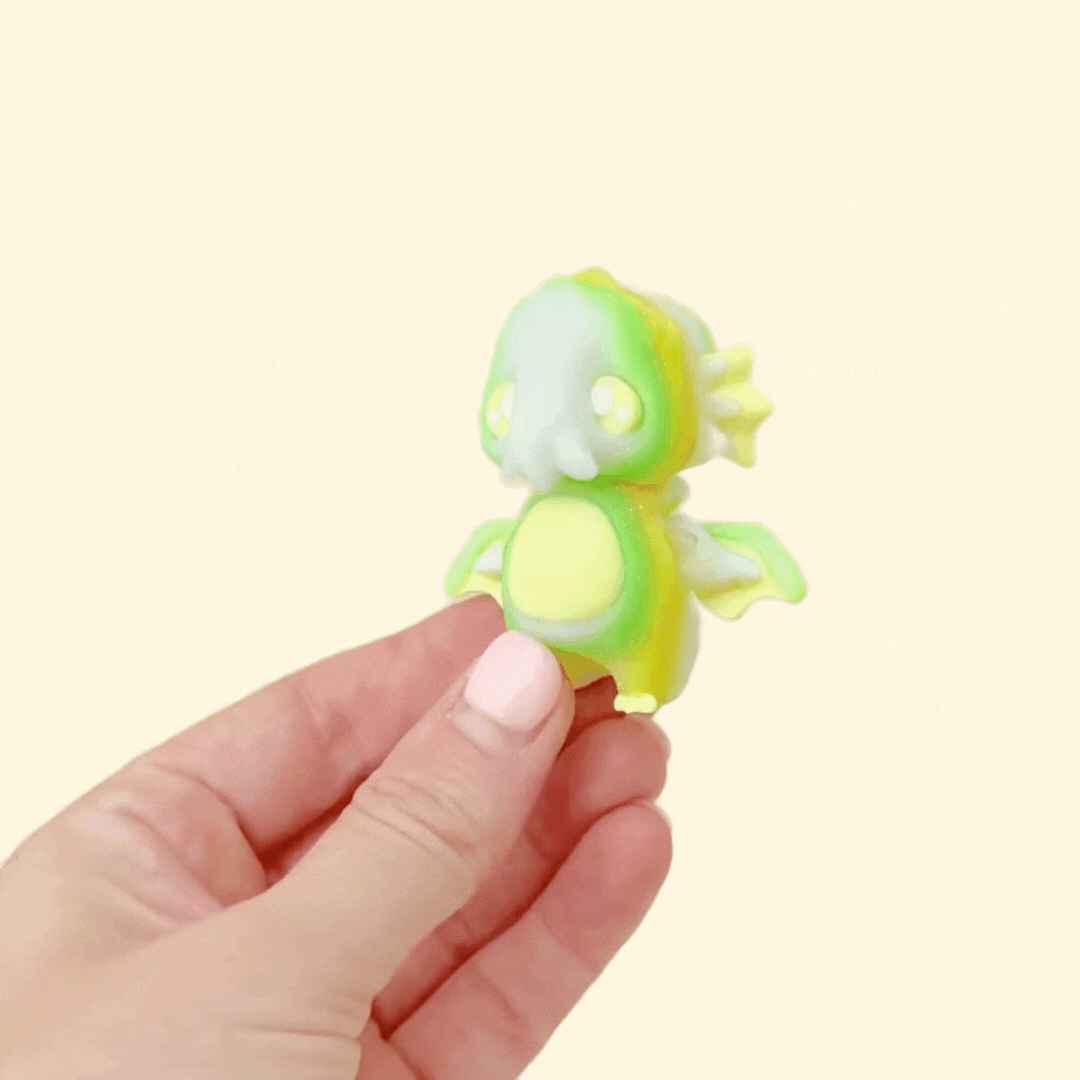 miniature articulated toy with glow elements suitable for neurodivergent users and collectors