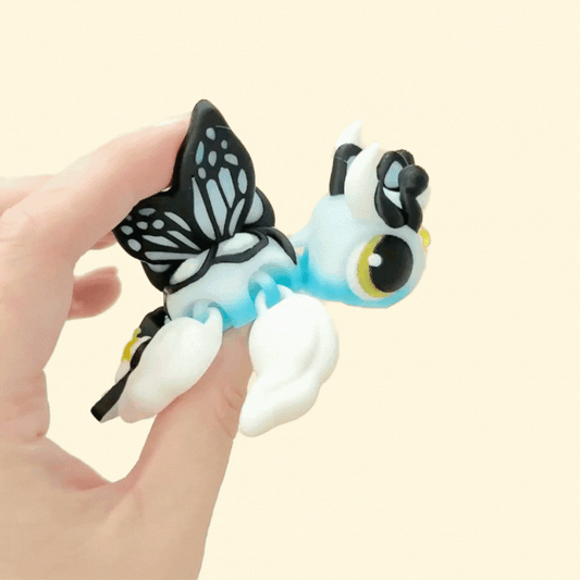 Flexible Gemini-themed turtle fidget toy with movable parts and textured wings