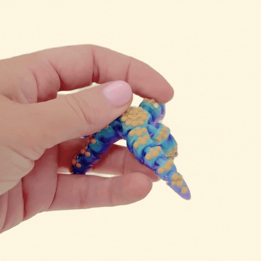 A silent, flexible starfish fidget designed for gentle tactile stimulation and calming movement.