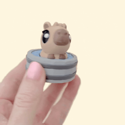 Cute animal clicker fidget designed for focus breaks, repetitive hand movement, and sensory regulation.