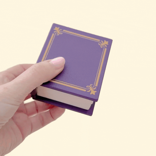 Set of twelve mini chocolate designs for choosing four pieces inside a Treats and Tales box.