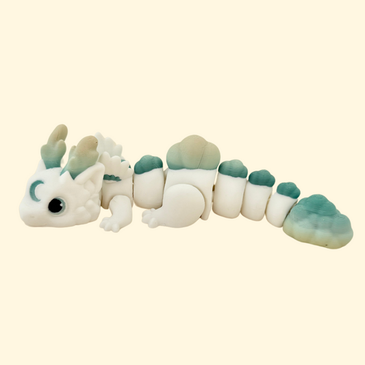 General view of a fully articulated dragon fidget toy with a calm, cloud-like design.