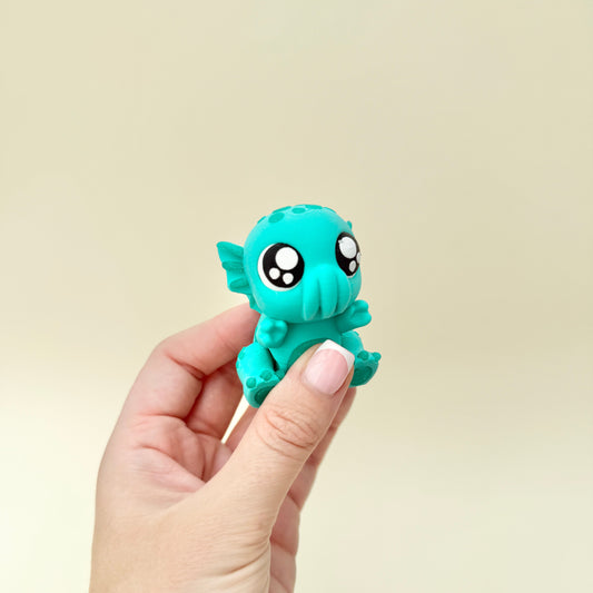 Tactile sensory toy with smooth finish, flexible joints and subtle glitter detailing