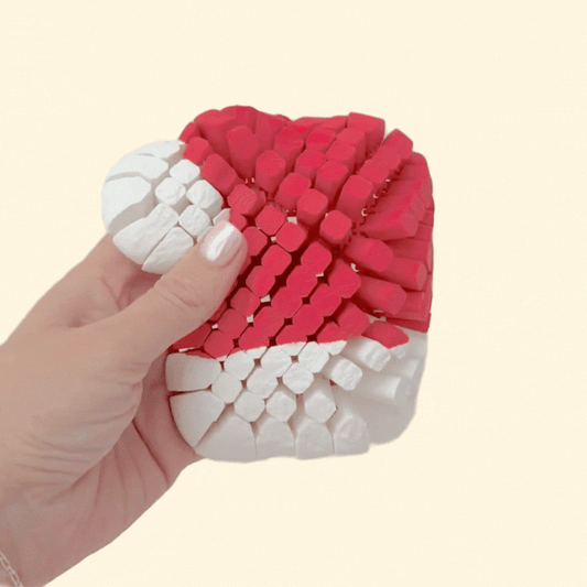 Flexible hat folded to show flowing movement, textured surface for grounding and discrete, quiet fidgeting.