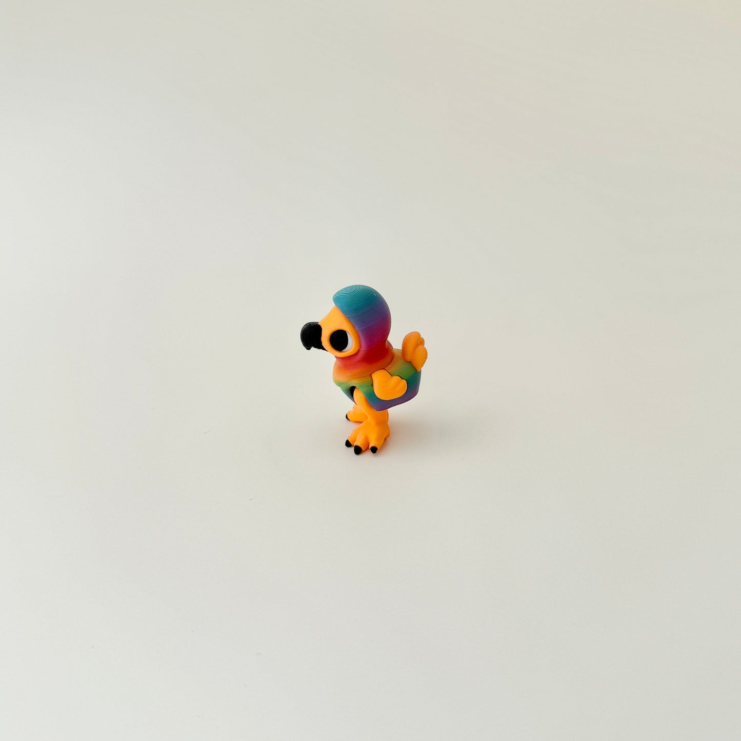 tiny articulated bird toy suitable for sensory regulation and on-the-go use