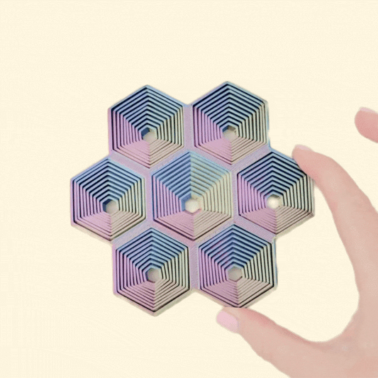Flat-surface fidget designed for focus breaks, ASMR clips, and satisfying repeating motion.
