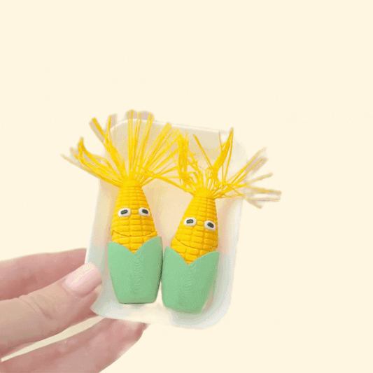 Quiet, handheld food-themed fidgets designed for quick focus breaks and gifting.