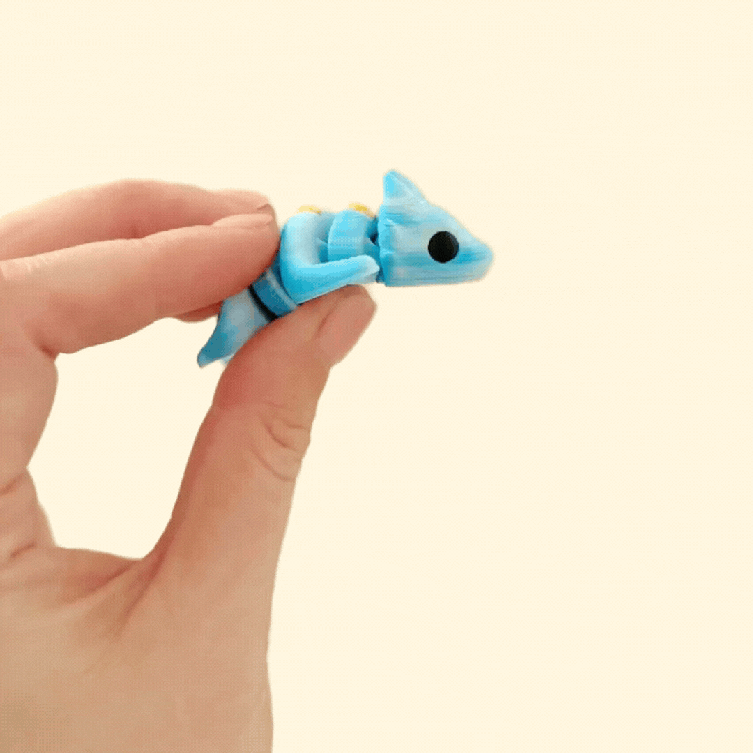 A moveable dragon fidget toy designed for tactile sensory play and stress relief.
