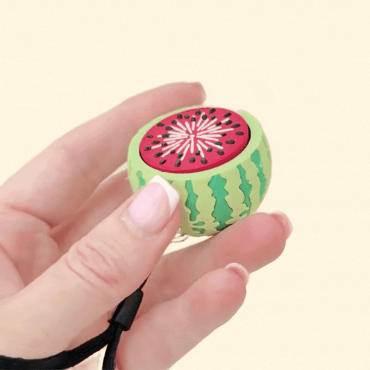 chunky watermelon themed stim tool with raised seed details for pain stimming