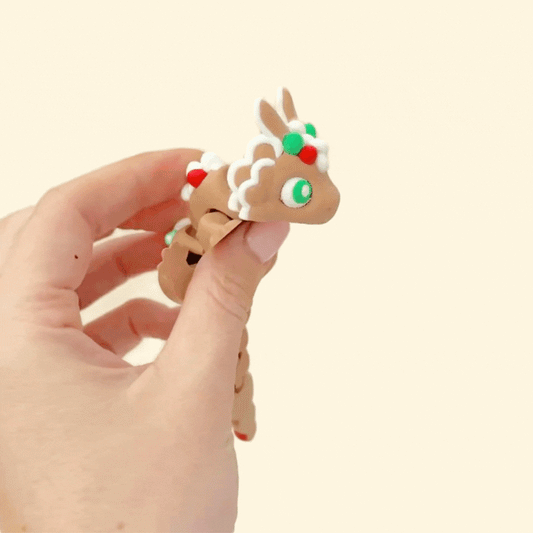 Seasonal dragon fidget that doubles as a cosy Christmas desk or shelf display.