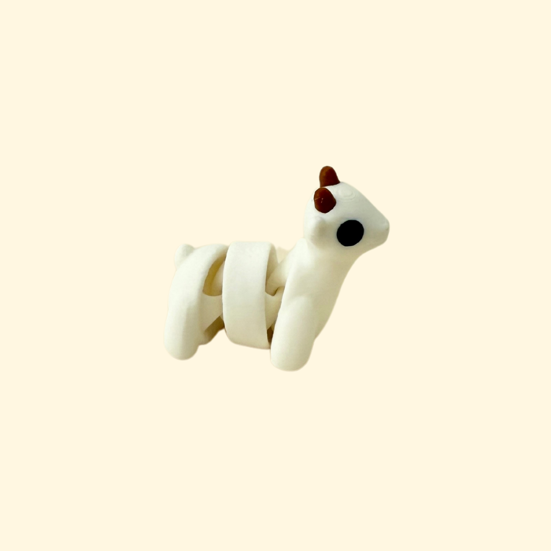A fully articulated goat fidget toy, designed for sensory play and relaxation.