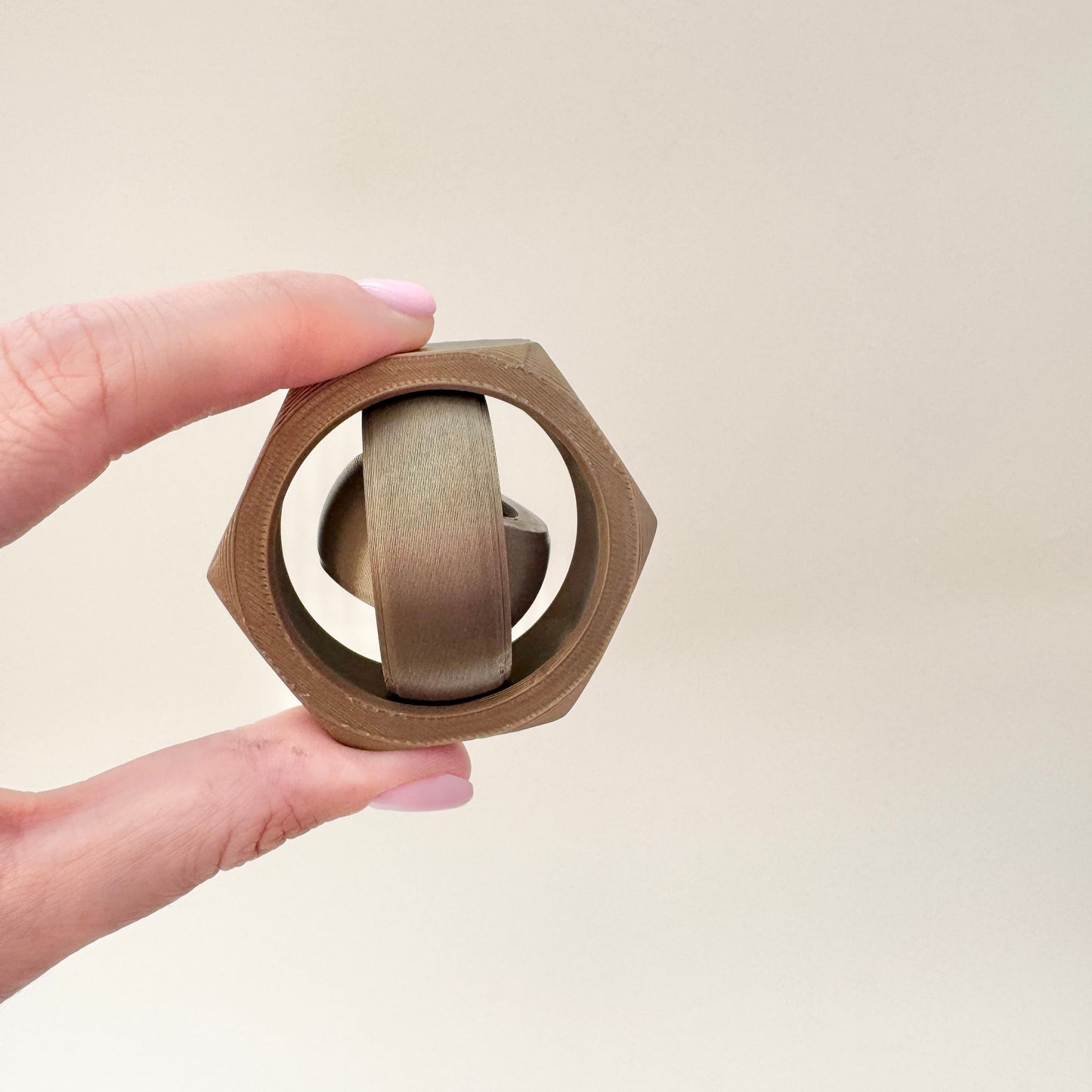 Durable 3D-printed spinner for makers, engineers, and fidget fans.