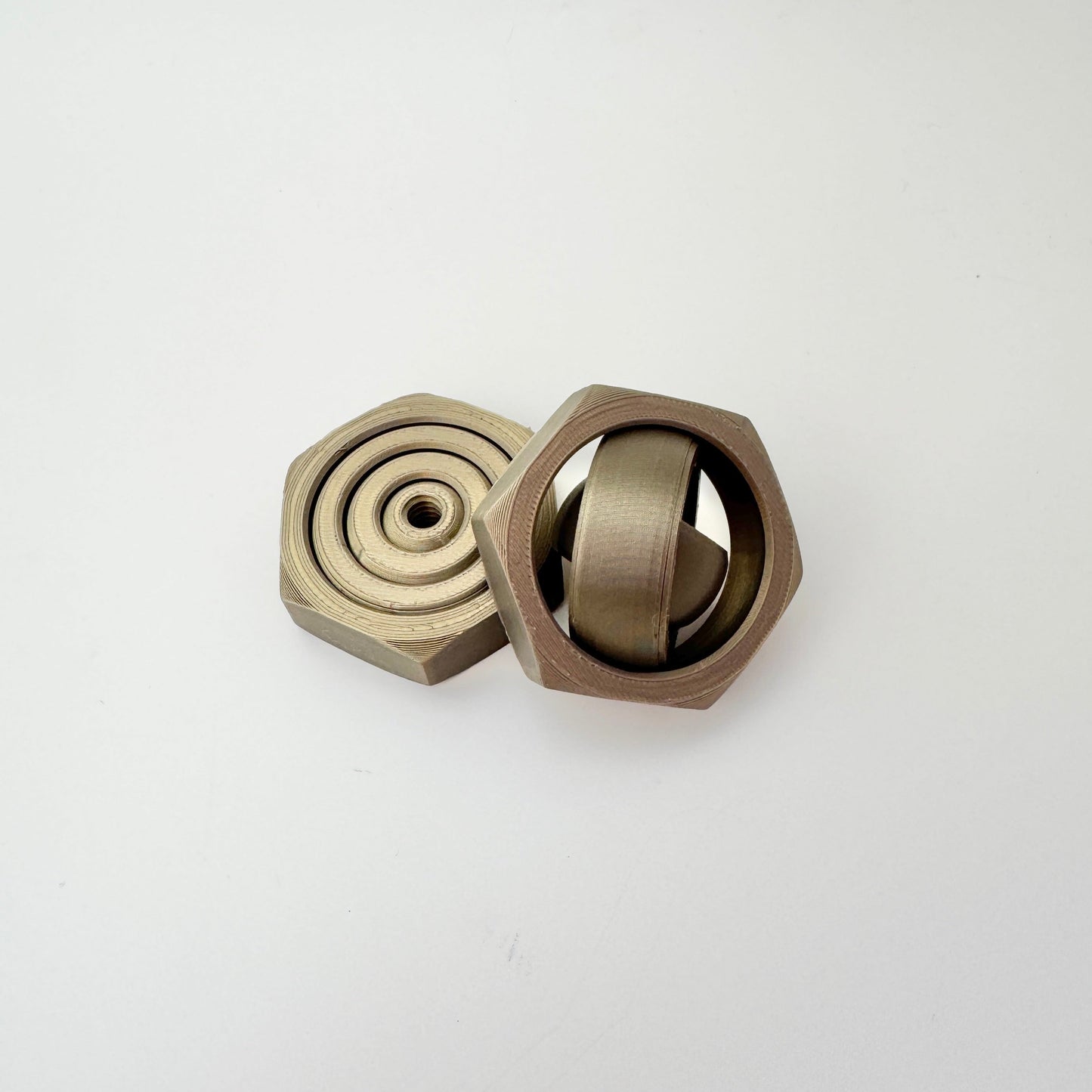 Six-sided nut body offers secure pinch grip and pressure-stim edge.