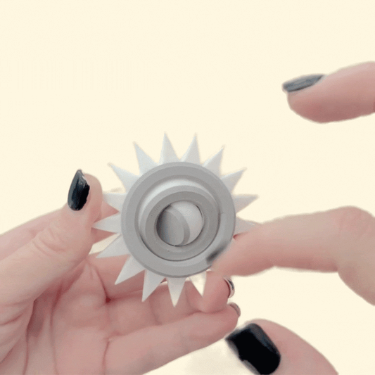 rigid handheld spinner for grounding and regulation