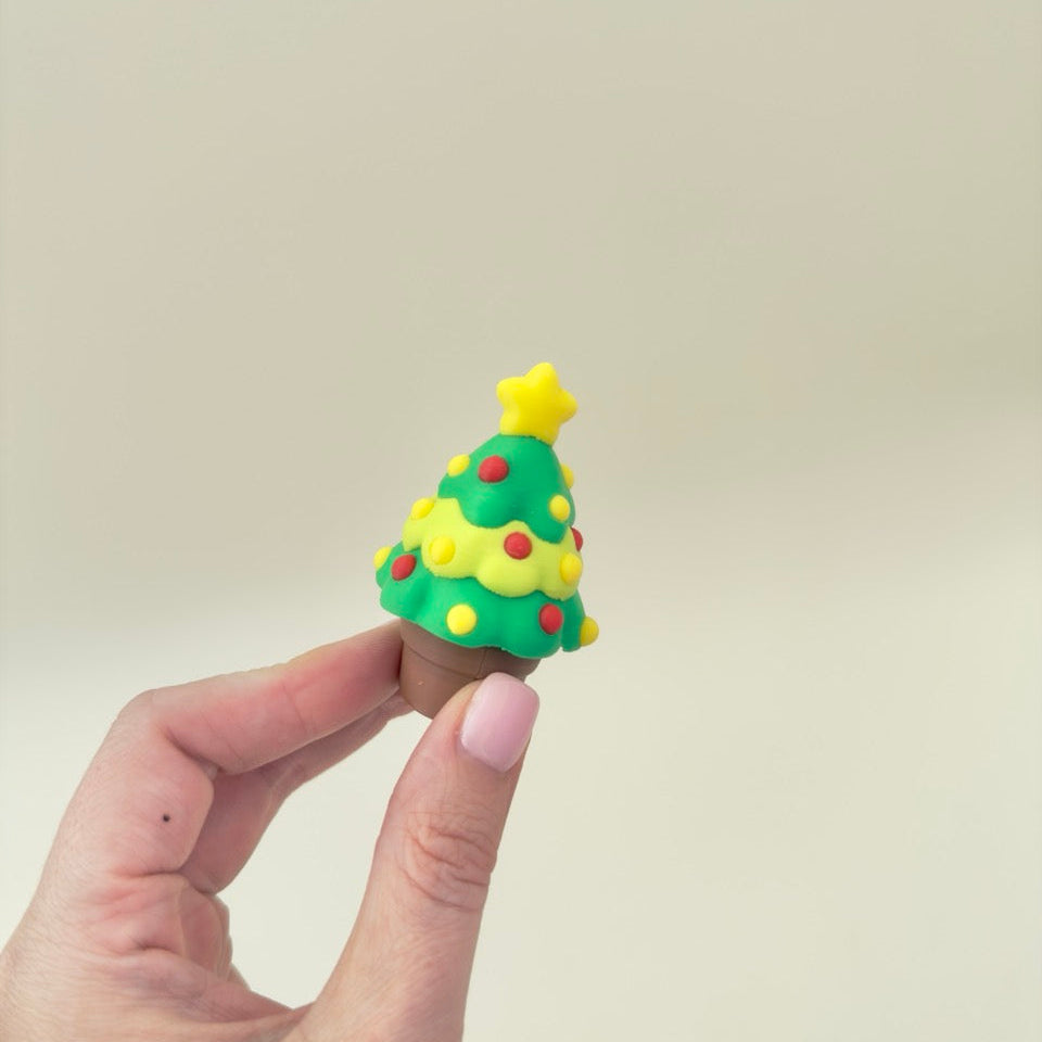 Tactile Christmas tree clicker for sensory seekers; repeatable press-to-reset motion; giftable size.