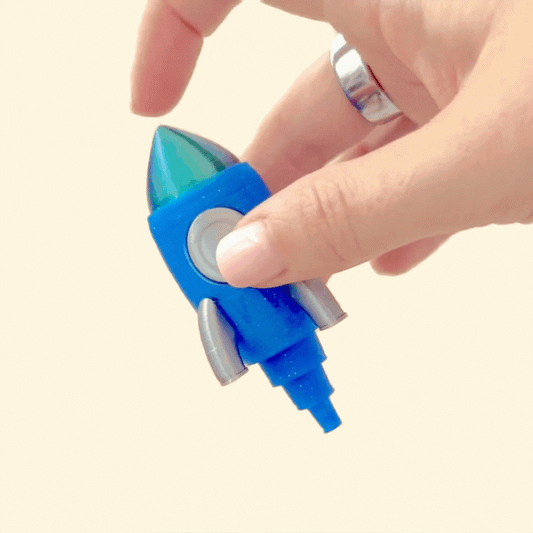 Compact desk figurine in sparkly blue with soft highlights.