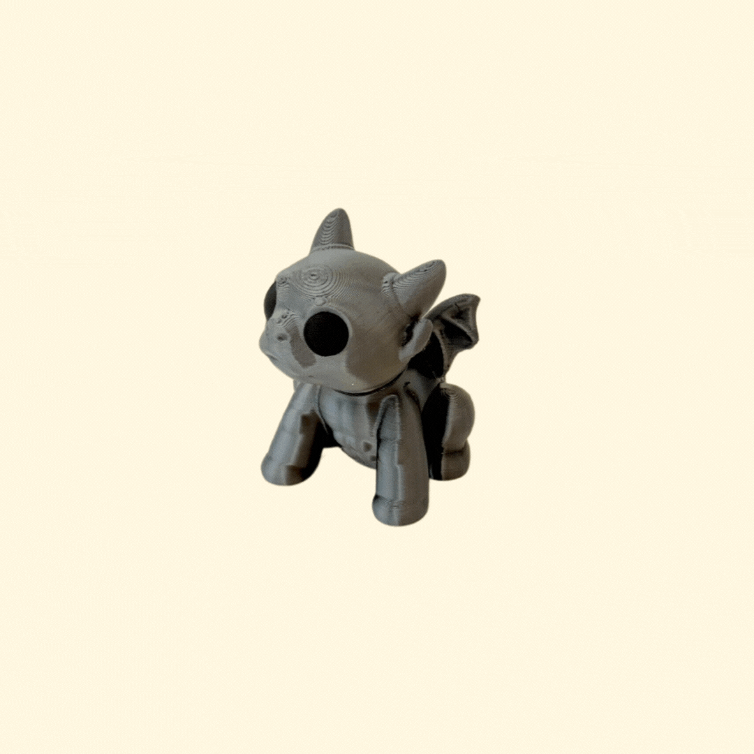 small gargoyle fidget with rotating head and textured wings for sensory play