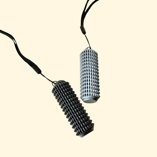 rigid handheld sensory tool with mid-intensity spikes for grounding and pain stimming