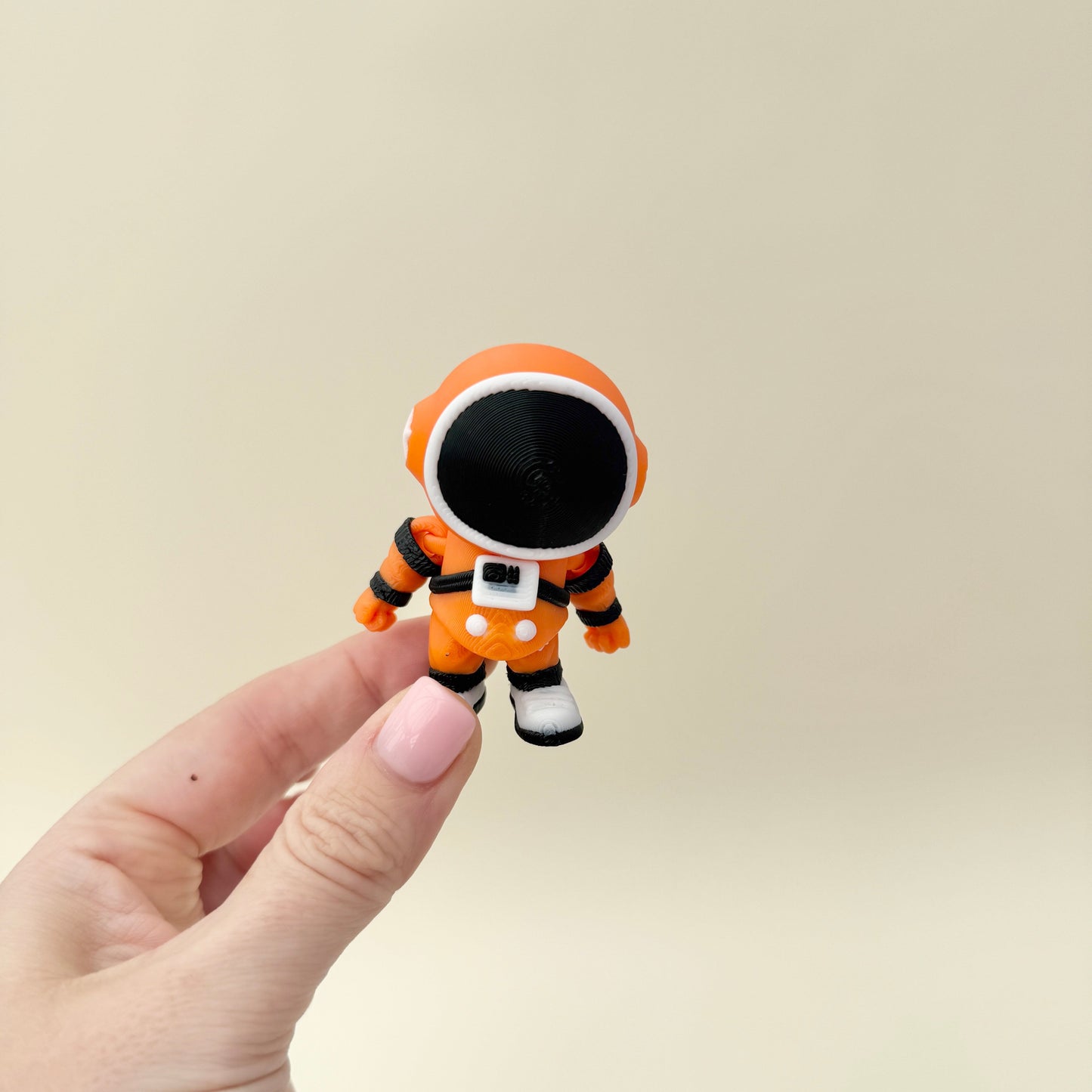 Pocket-size figure that stands out as a fun desk companion.
