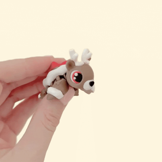 A small, handheld fidget with a smooth finish and subtle textures designed for discreet sensory play.