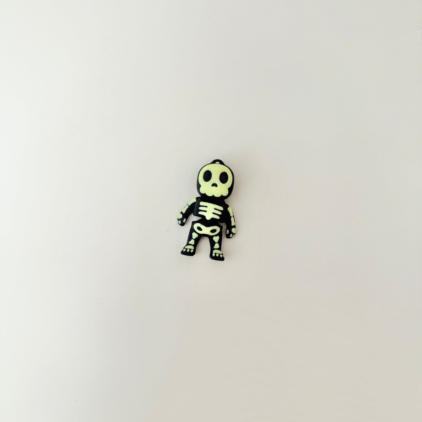 mini skeleton charm with raised bone texture for tactile stimming