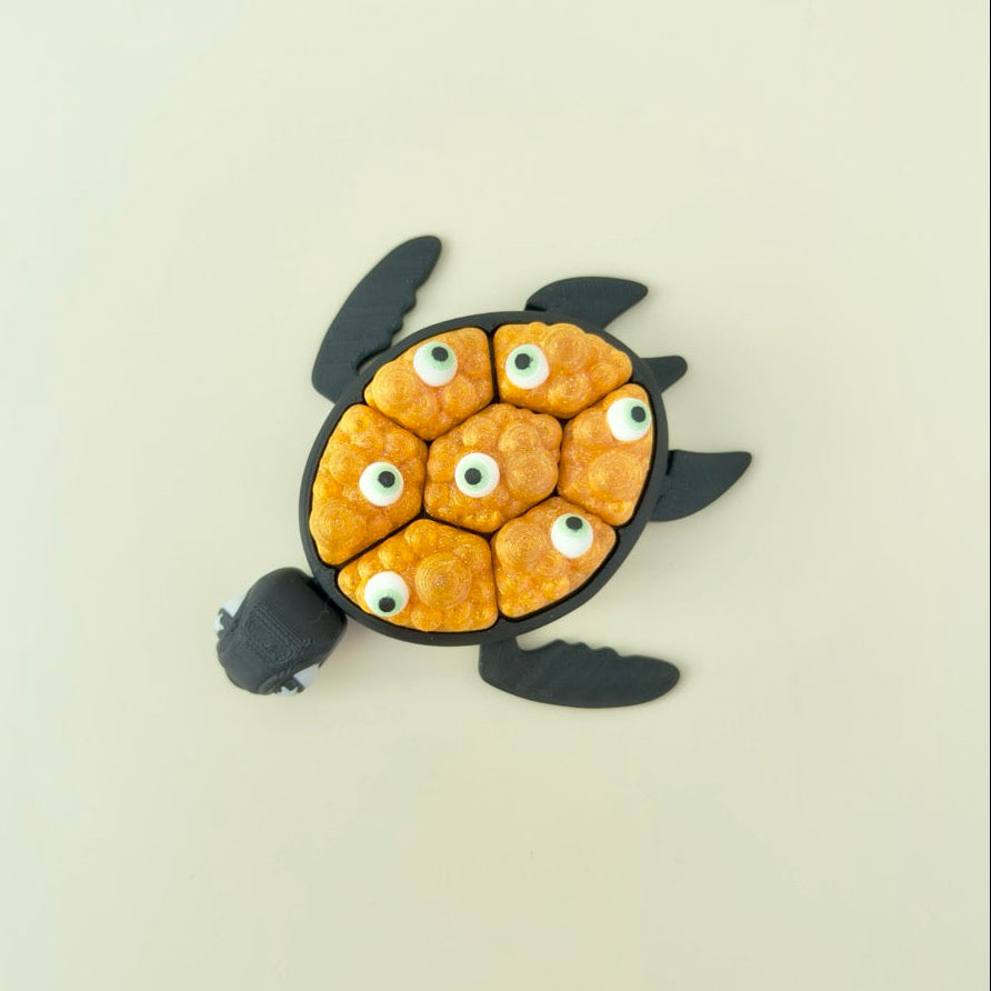 halloween sensory clicker with textured bubble top and eyeball details