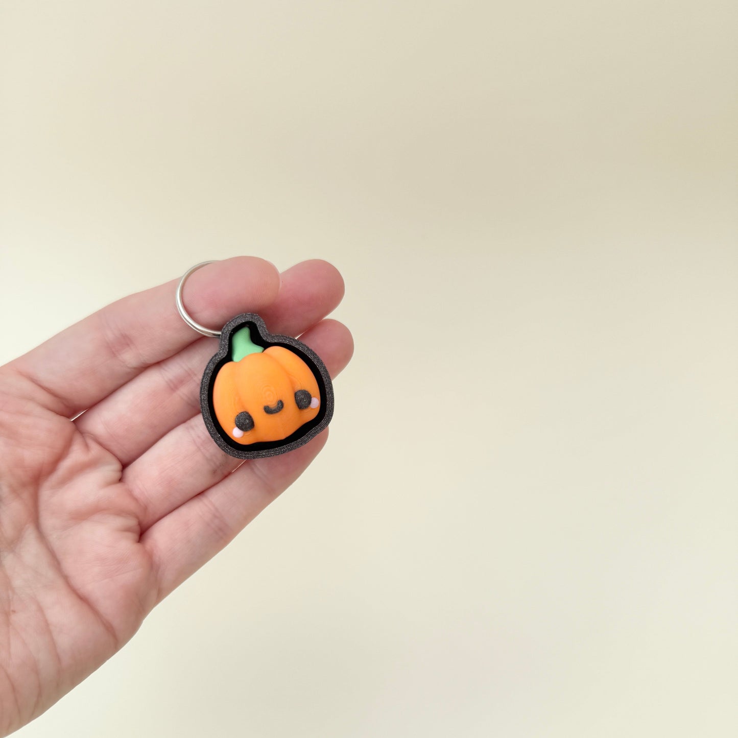 pumpkin-themed clicker fidget available with a quiet click option