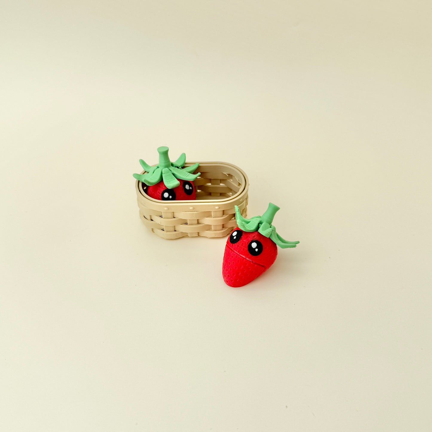 small strawberry fidget pair with basket holder for adults and neurodivergent users