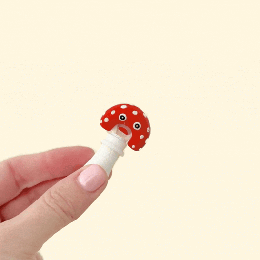 A small, interactive fidget toy with a moving top.