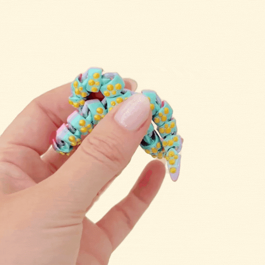 Limited-edition rainbow starfish, smooth tactile stimulation and easy flexibility for quiet fidgeting.