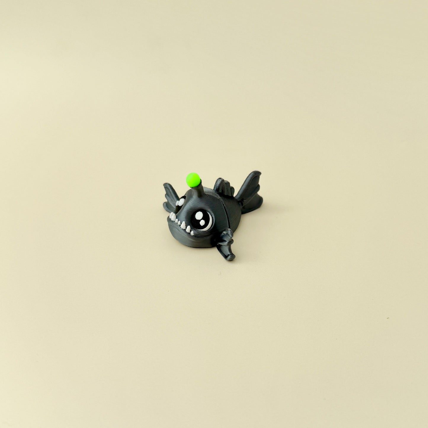 Unique underwater-themed fidget toy with a shiny body and tactile movement