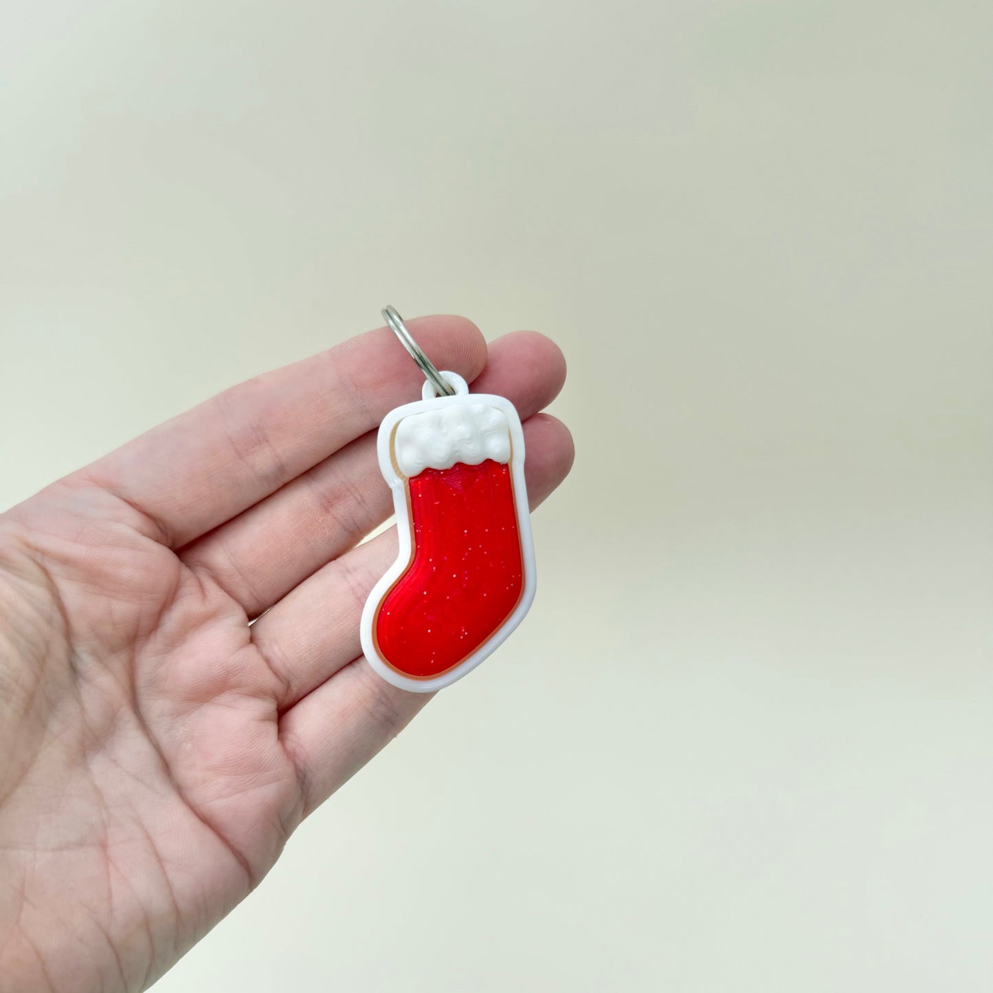 Gloss finish stocking clicker offering audible feedback and gentle vibration on press; upgradeable to quiet click.