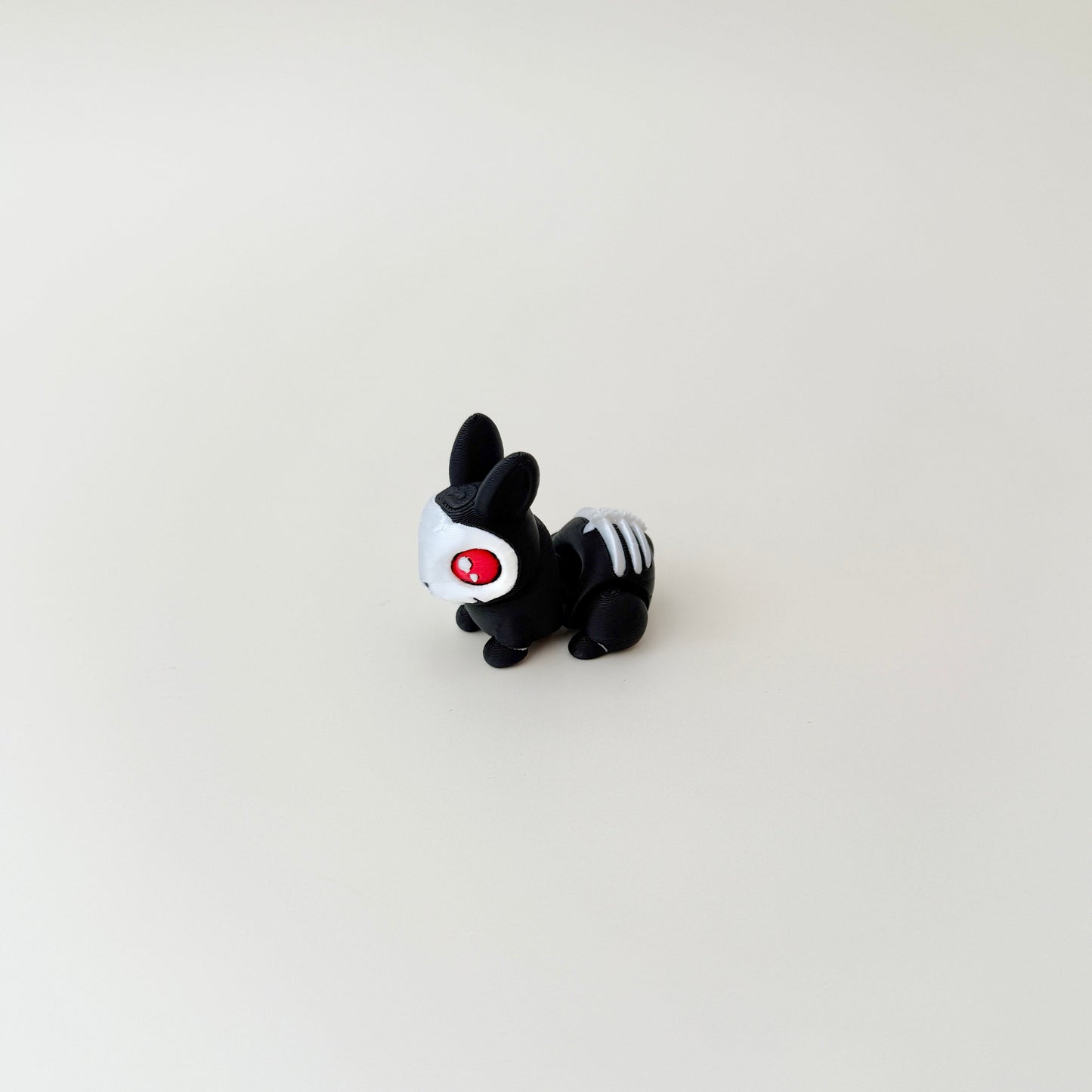 mini skeleton bunny in a woven basket designed for quiet tactile stimming