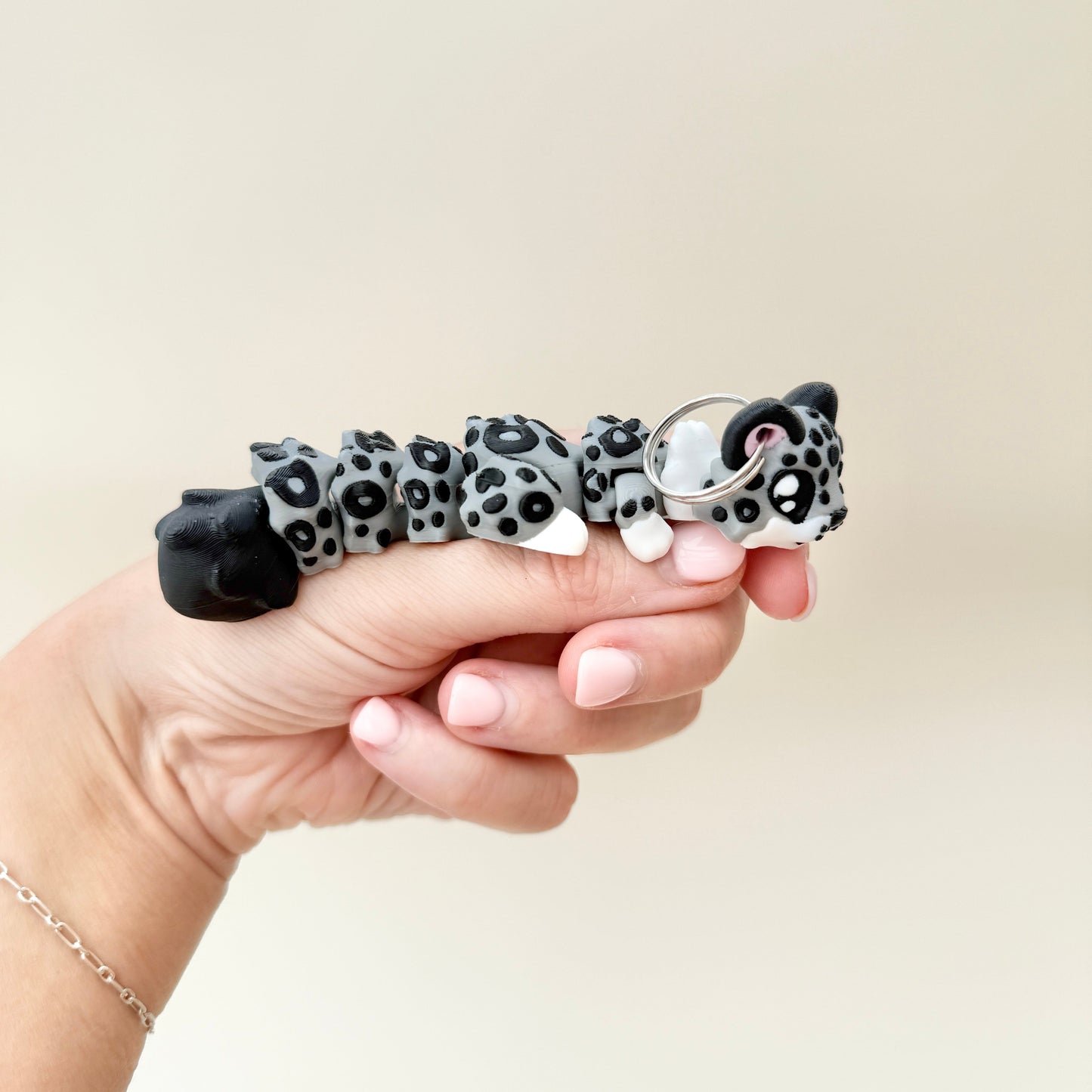 mini articulated fidget suitable for bags, keys, or everyday sensory play