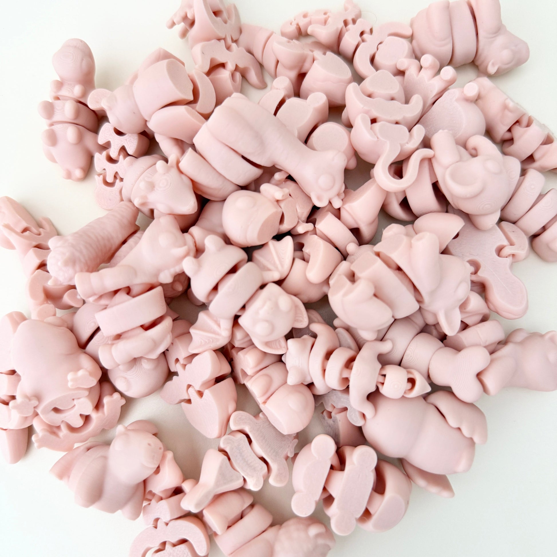 A SoftTone Mini Pet with flexible joints, designed for calming sensory play.