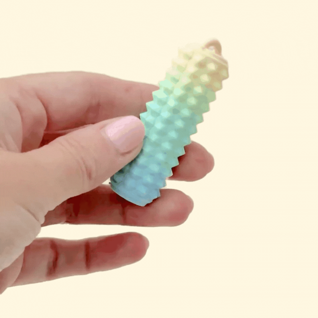 Cylindrical fidget tools with varying levels of tactile feedback and grip textures