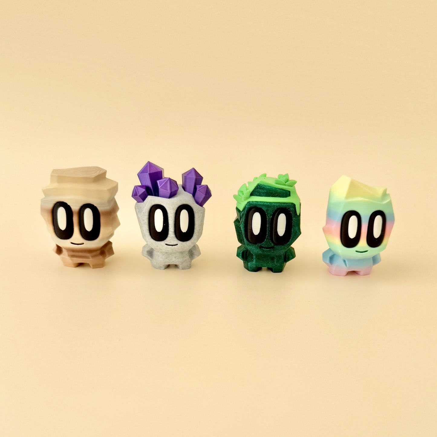 A black shimmering pet rock with greenery sprouting from its head, featuring big eyes and a smile, alongside its brown carry box.
