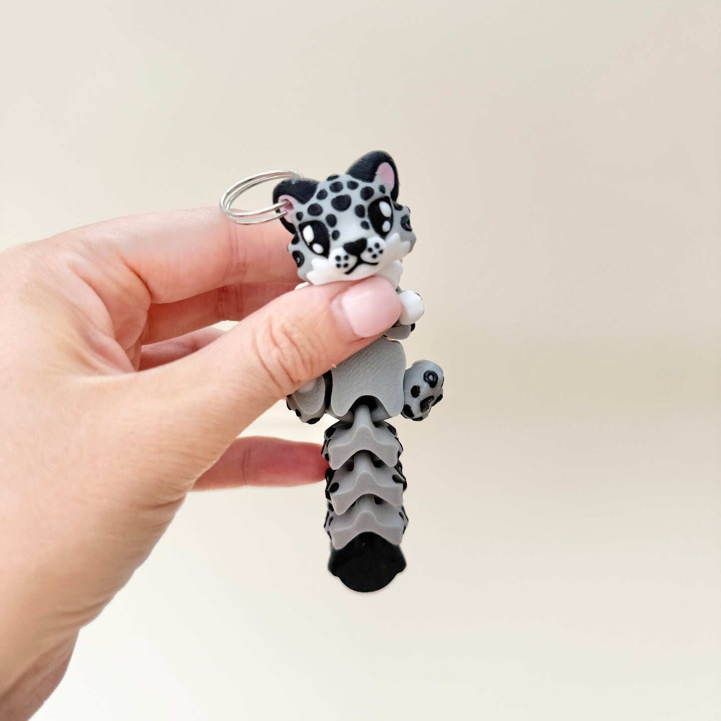 compact articulated creature with raised details for tactile stimming