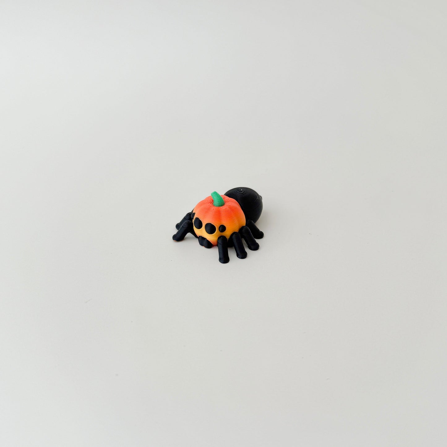 portable hybrid creature with raised details suitable for tactile input