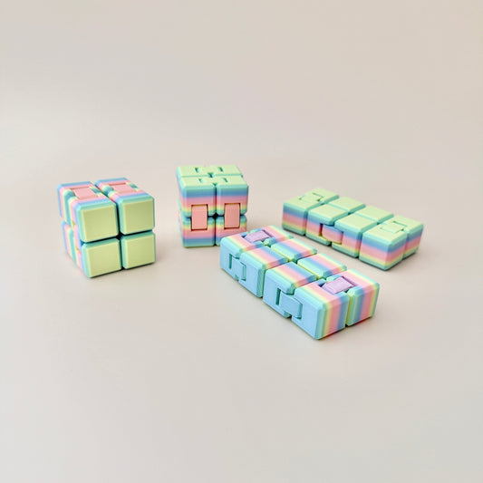 Flexi-Cube with dynamic movement, allowing it to split, rotate, and reshape for engaging sensory play.