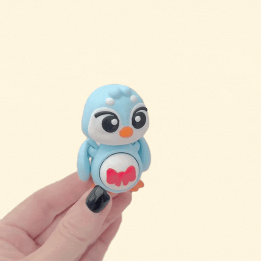 Small articulated figure with a pressable centre for fidgeting