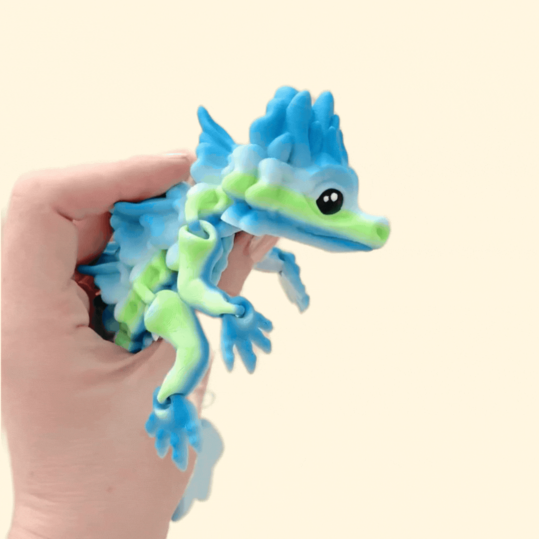 Large 19cm dragon fidget toy with vibrant gradient colours and fully articulated legs for sensory play.