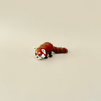 Fully articulated red panda fidget toy posed standing, highlighting its moveable legs, tail, and lifelike design.
