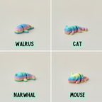 Rainbow mini pet with movable body parts, perfect for stress relief and sensory engagement.