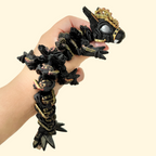 Large flexible dragon fidget toy with textured gear-style details and raised surfaces for tactile sensory play