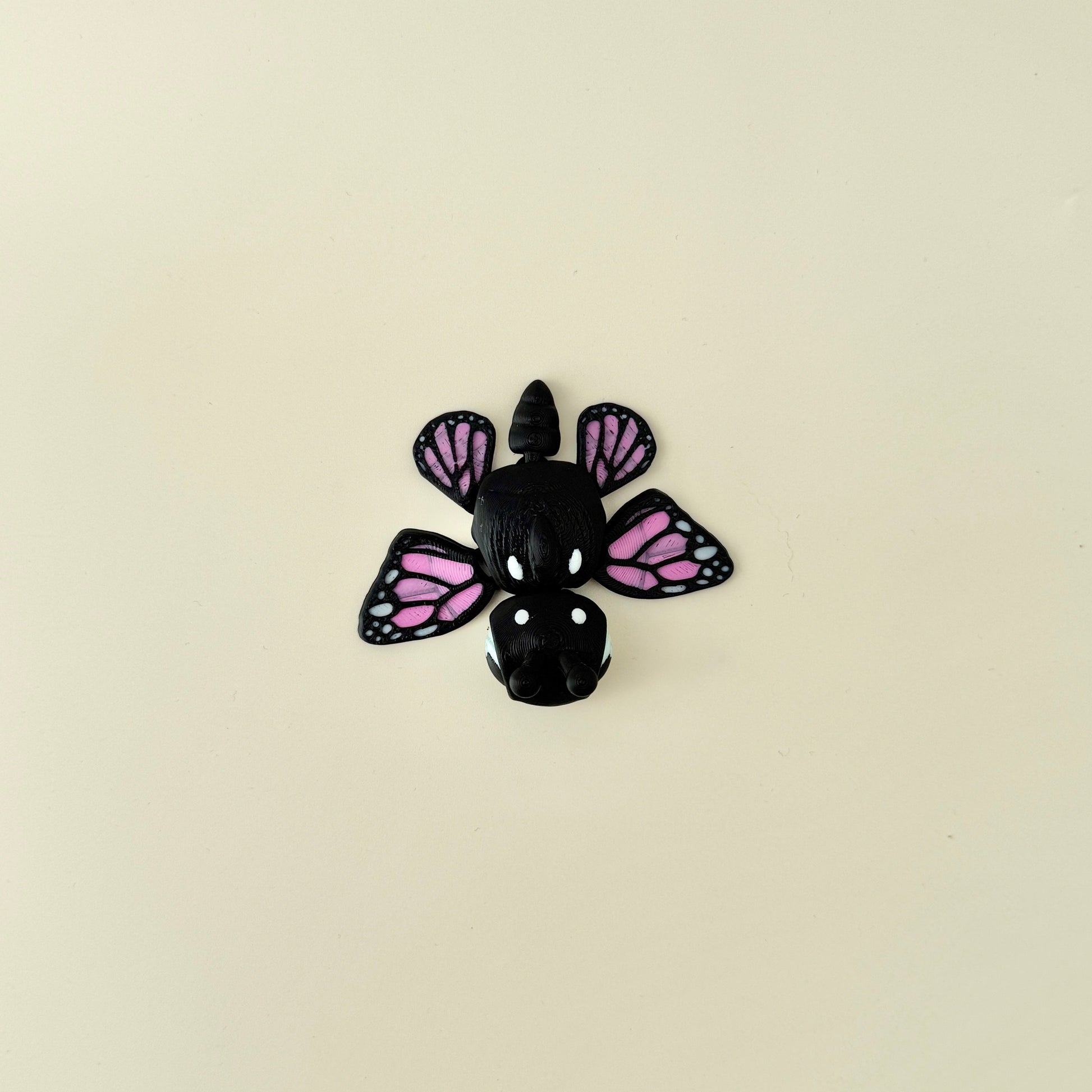 Compact fidget turtle with butterfly wings, ideal for hands-on sensory engagement and quiet play.