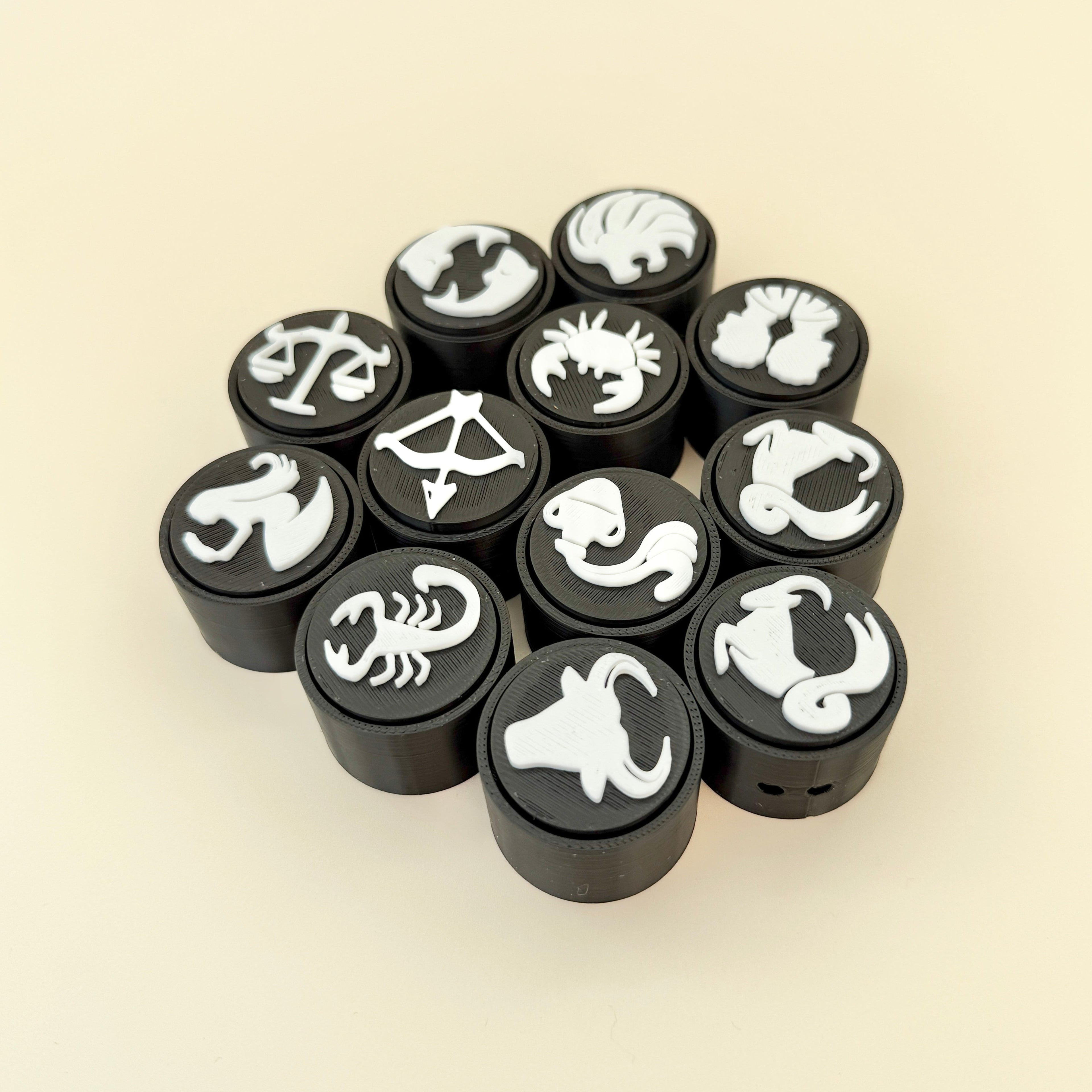 Black zodiac-themed clicker, suitable for sensory seekers and astrology lovers; optional keyring attachment available.