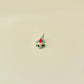 Small, quiet-moving holiday fidget for discreet sensory breaks.

