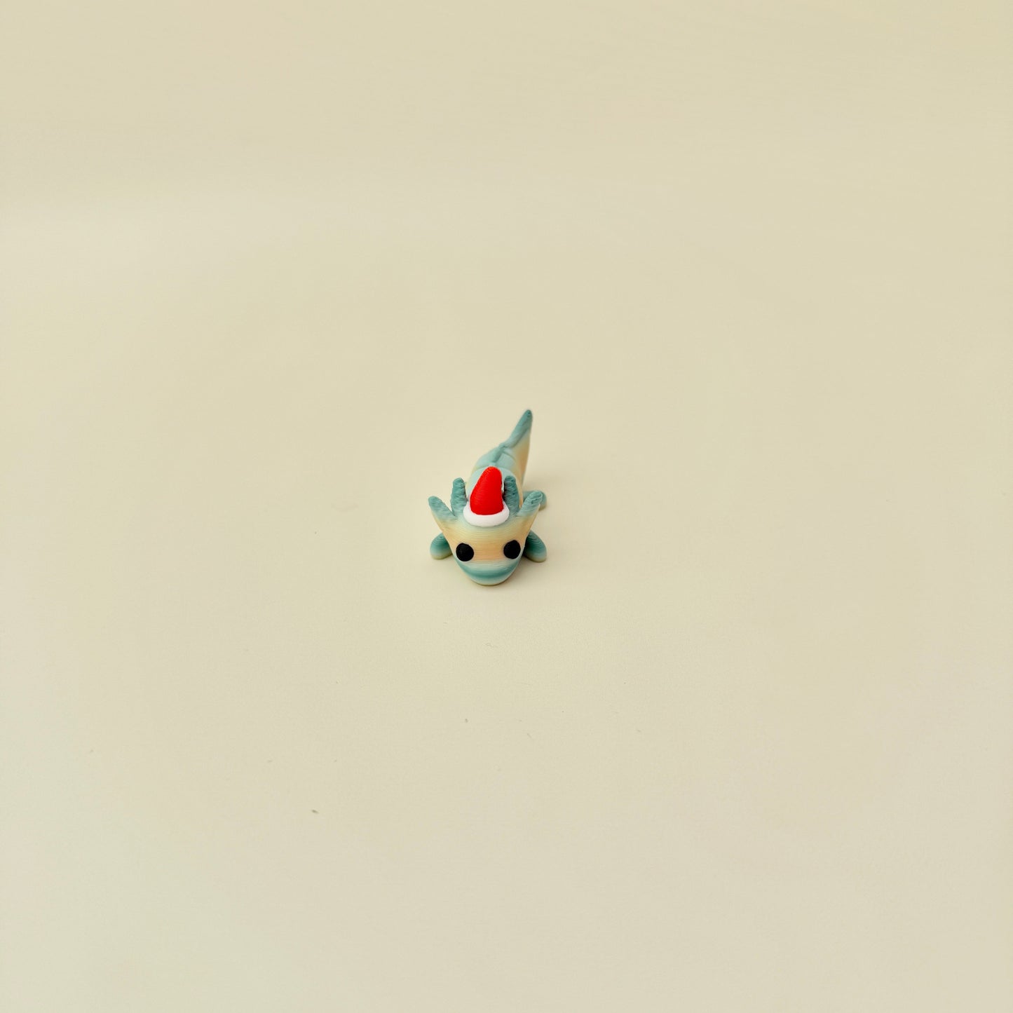 Small, quiet-moving holiday fidget for discreet sensory breaks.
