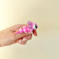 Articulated pink axolotl sensory fidget with shimmer accents